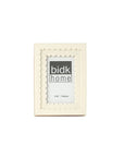 The BIDK Home 4x6 Floral Resin Frame features a cream color and scalloped inner border, making it perfect for elegant decor. It displays a "bidk home" placeholder image with the size "4 x 6 in | 10 x 15 cm" on a plain white background.
