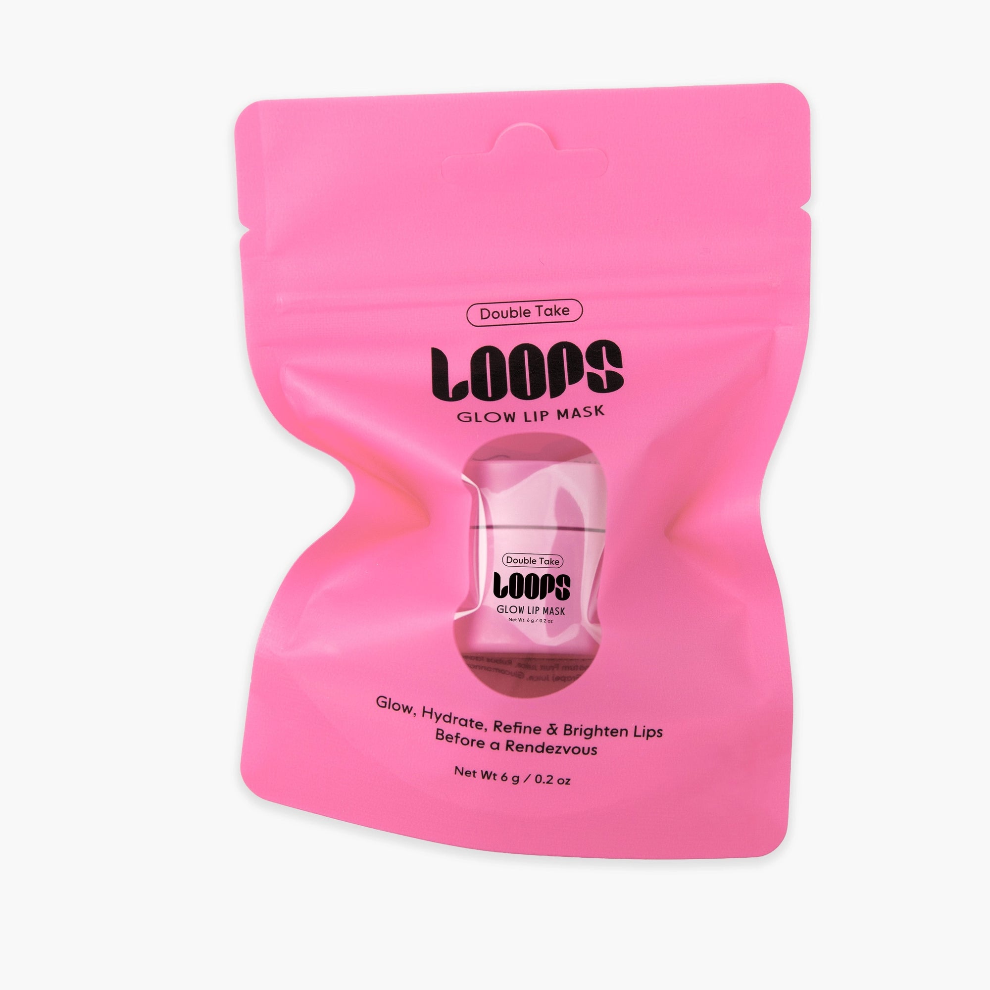 A pink resealable pouch from Faire labeled "LOOPS Glow Lip Mask" contains a hydrating mask that helps to hydrate, refine, and brighten your lips—perfect prep before any special occasion.