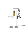 Two Faire Desk Wire Display Stand S units with a minimalist design are shown against a plain white background: the taller displays black eyeglasses and yellow-tagged keys, while the shorter stand remains empty.