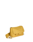 A mustard yellow leather Lulu Small Bag by Jerome Dreyfuss, featuring a flap closure, gold chain cross-body strap, and small decorative studs. The brand is subtly embossed on the flap. Set against a plain white background.