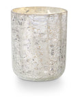 The Creative Co-op Crackle Glass Candle Small features a silver mercury glass votive holder with a crackle finish that gently reflects light. This cylindrical candle holder, with its textured surface, enhances decor and pairs beautifully with a small boxed candle to create an elegant ambiance.