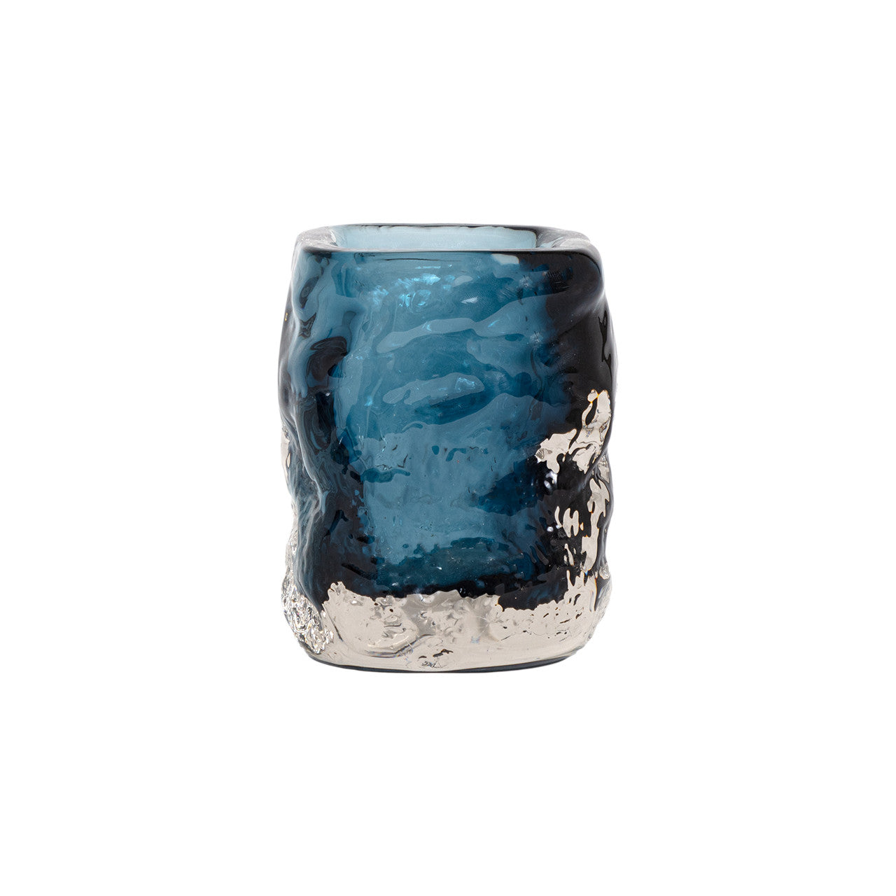 The Import Collection's Hendrick vase is a blue glass tumbler with an irregular, textured surface and metallic silver accents at the base and lower sides, displayed against a white background.
