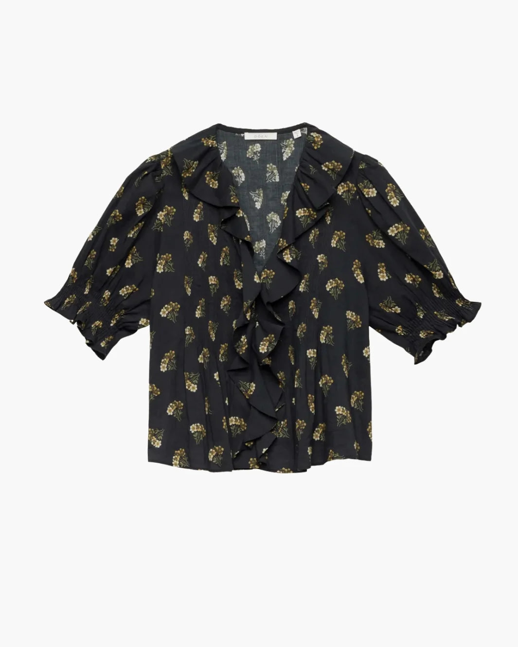 White blouse with ruffled V-neck and short puff sleeves, DOEN Henri Top in Buttercup Bouquet floral pattern.