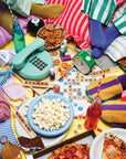 The Faire Pajama Party Puzzle features a lively scene with snacks, a vintage phone, board game, alarm clock, nail polish, and playful items—perfect for a 1000-piece recycled paper jigsaw.