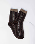 Faire Vintage Stripe Floral Socks in brown with tan cuffs feature light brown and white decorative vertical patterns, displayed flat on a white surface.