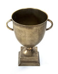 The Zentique Camille Trophy in antique gold features two handles and a square base, elegantly photographed on a white background—an eye-catching decor piece for any home.