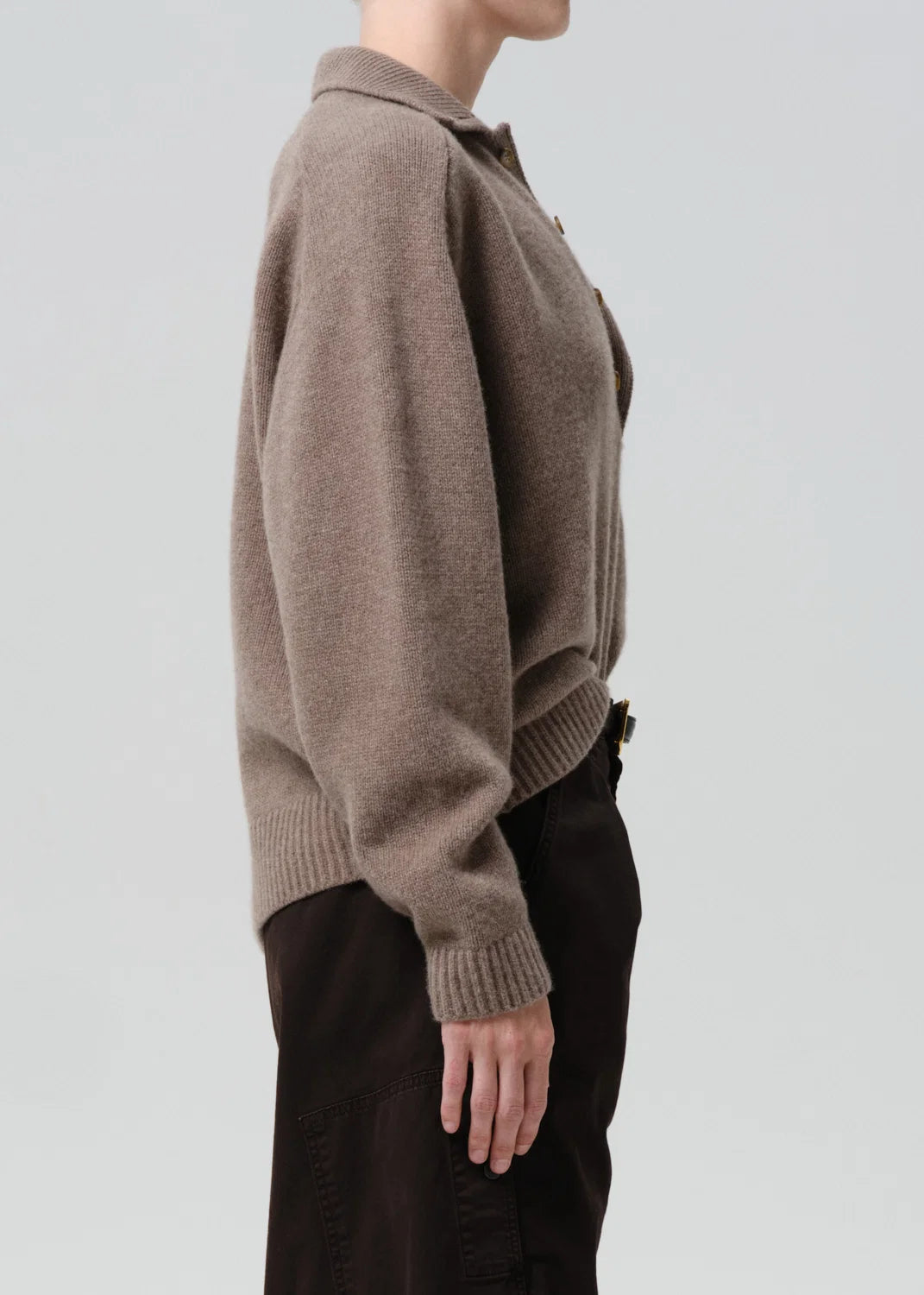 Agatha Rugby sweater by Citizens Of Humanity/AGOLDE in dark tones, side view styled with matching dark pants.