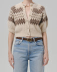Molly Puff Sleeve Cardigan in Fairisle by Citizens Of Humanity/AGOLDE with colorful patterned knit, shown waist up.