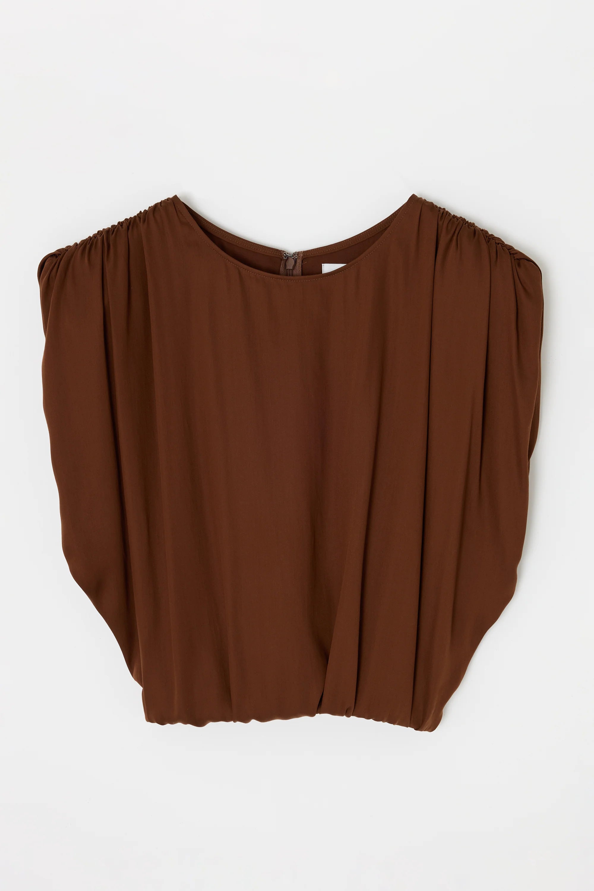 The MV Satin Shell Cap Top by Moussy is a sleeveless dark brown blouse with gathered shoulders and a round neckline. Its voluminous drape adds versatility, shown here flat on a white background.