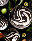 Faire’s Porcelain Serving Bowls - Black & White 10" feature striking marbled patterns, adding an artistic, modern touch to any table—ideal for handcrafted bowl collections.