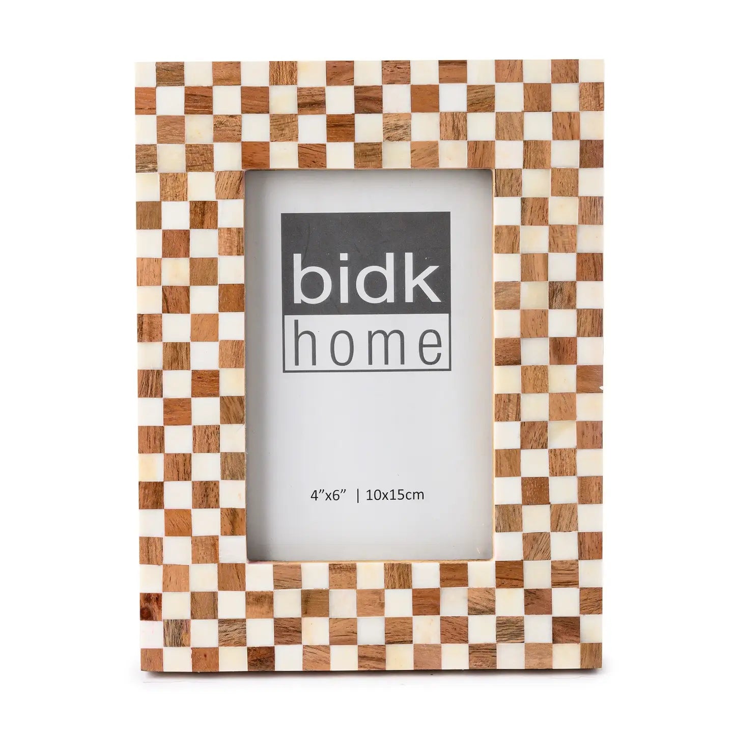The 4x6 Bone/Wood Frame by BIDK Home features a beige and brown checkerboard pattern, ideal for home decor, and fits a 4&quot;x6&quot; photo. &quot;BIDK Home&quot; appears in gray and black text at the center.
