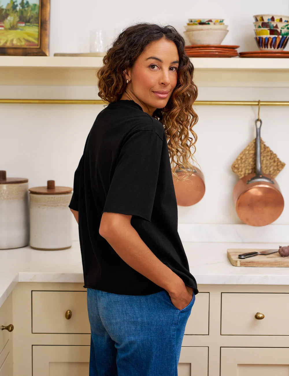 Black Frank &amp; Eileen Perry NYC Crew Tee styled in a cozy kitchen setting with relaxed, casual elegance.