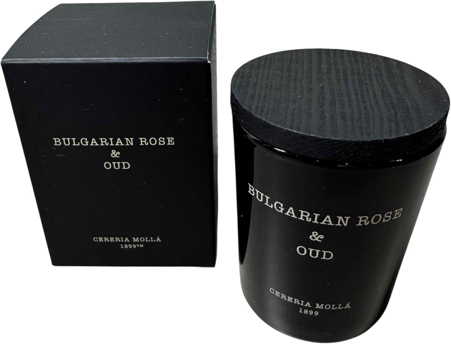 The Bulgarian Rose & Oud Mini Candle (2.4 oz) by European Scents LLC features a luxury fragrance in a black jar with wooden lid, elegantly packaged in a matching box.