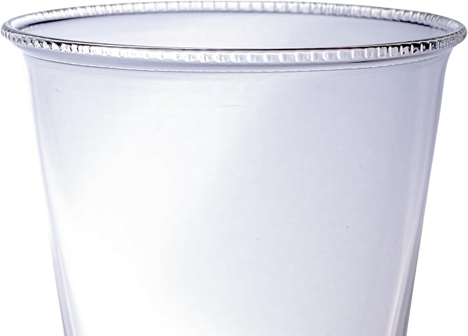 A close-up of Creative Co-op's Drinking Glass w Debossed Rim, featuring a decorative top edge and clear design against a white background. Each glass is sold separately.