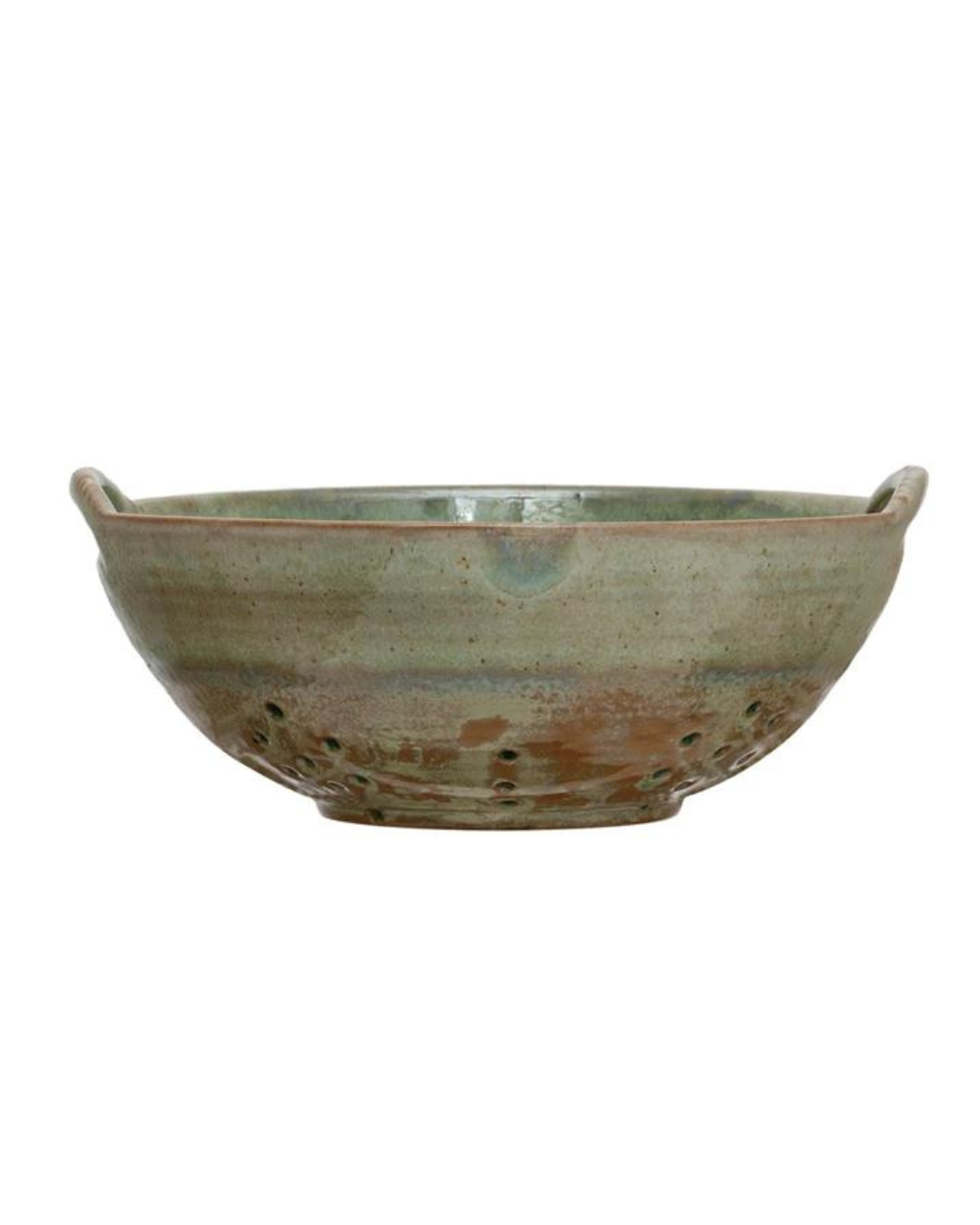 The Creative Co-op Berry Bowl is a rustic, round stoneware piece featuring earthy green and aqua tones. It includes two small handles on either side for easy gripping and numerous drainage holes on the bottom half. The reactive glaze lends it a handmade appearance, showcasing an artisanal design.