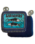 The Faire Beaded Sardine Tin Coin Purse features two fish and “SARDINES” on a blue beaded front, decorative loops along the top, and a plain dark blue back, evoking the look of a sardine can label.