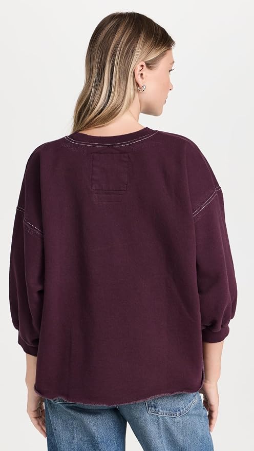Rachel Comey Fond Sweatshirt in light brown, styled with blue jeans, model shown from the back.
