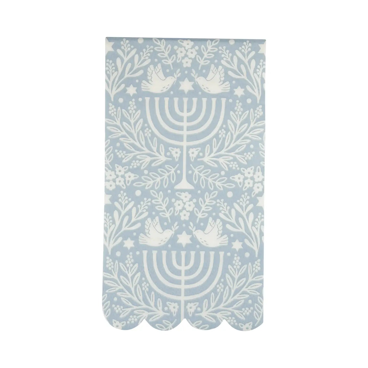 The MME Napkin by Faire is adorned with a light blue and white symmetrical design, showcasing doves, menorahs, floral patterns, and stars. It also features scalloped edges.