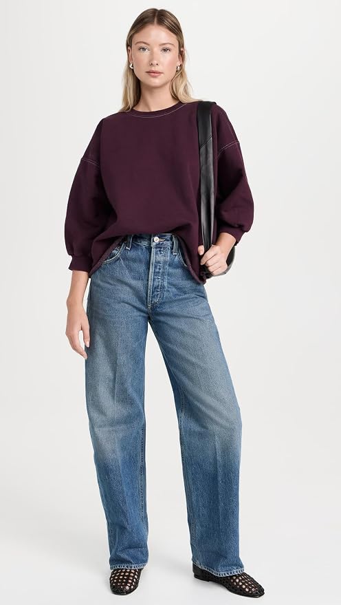 Rachel Comey Fond Sweatshirt in cream with blue jeans, casual style, plain backdrop, women’s clothing.