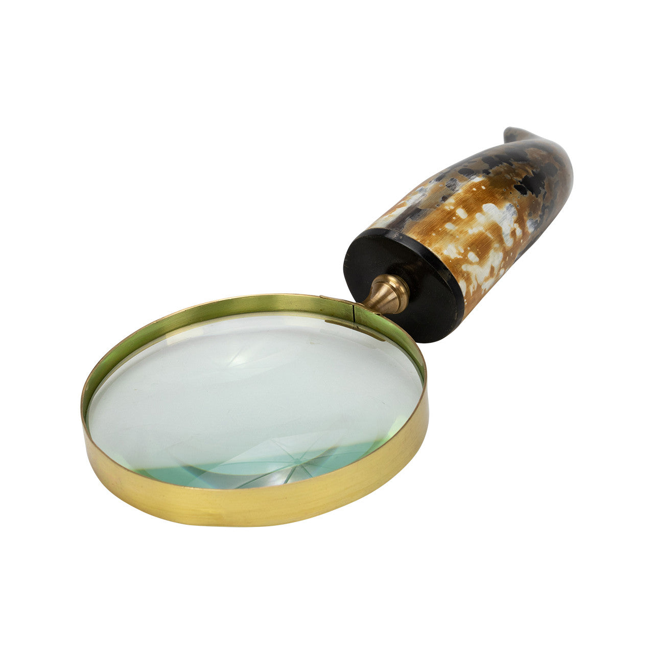 The Import Collection’s Abbott Magnifying Glass features a brass frame and a brown, black, and white marbled handle, making it a stylish decorative accent. Photographed on a white background.