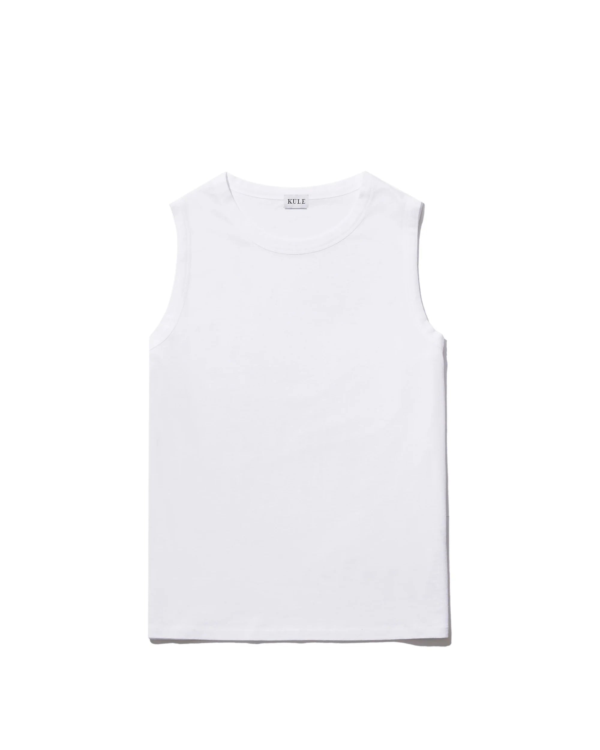 The Tank by Kule is a sleeveless white crew neck top made from soft organic cotton, shown laid flat on a plain white background. This machine washable shirt offers everyday comfort and ease.