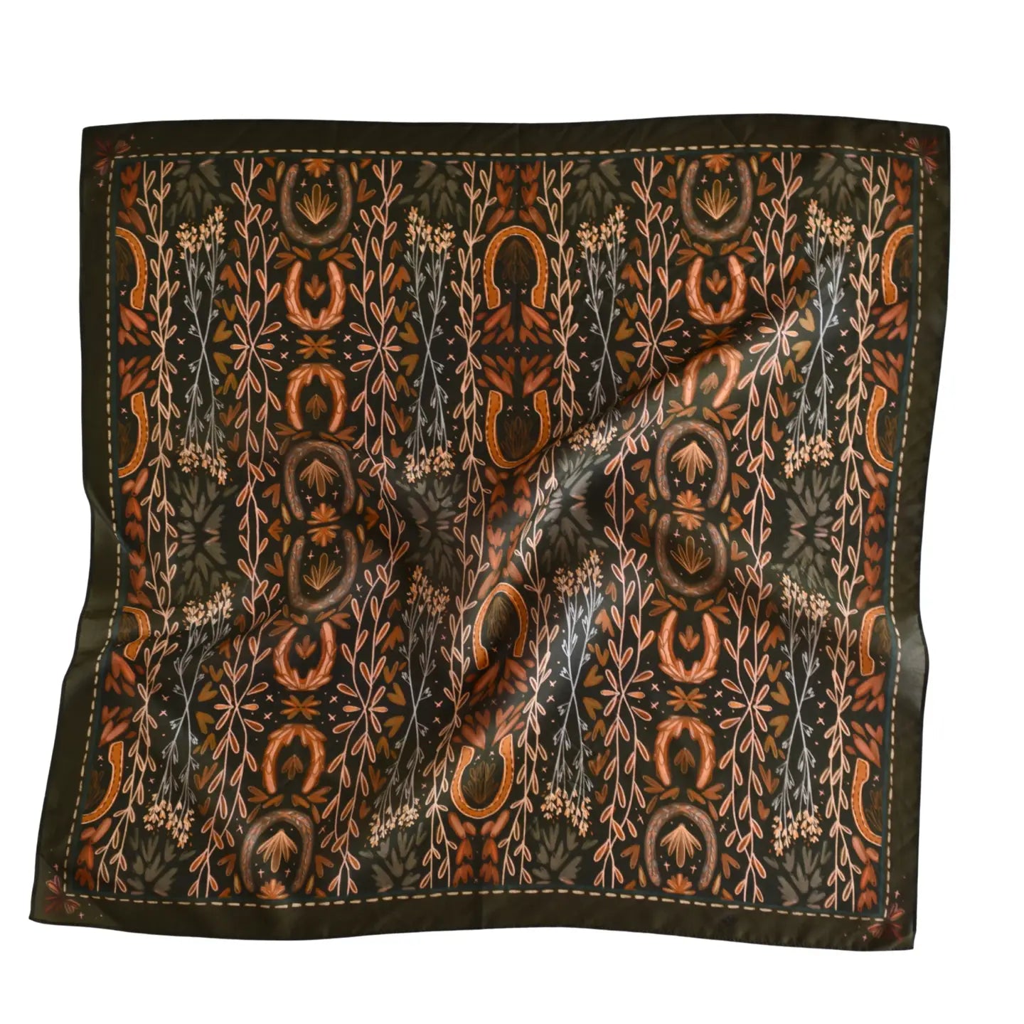 The Faire Wild Rag Silk Scarf features an intricate horseshoe, leaf, and floral pattern in orange, brown, and gold on black with a crumpled texture—an essential cowgirl accessory for any wardrobe.