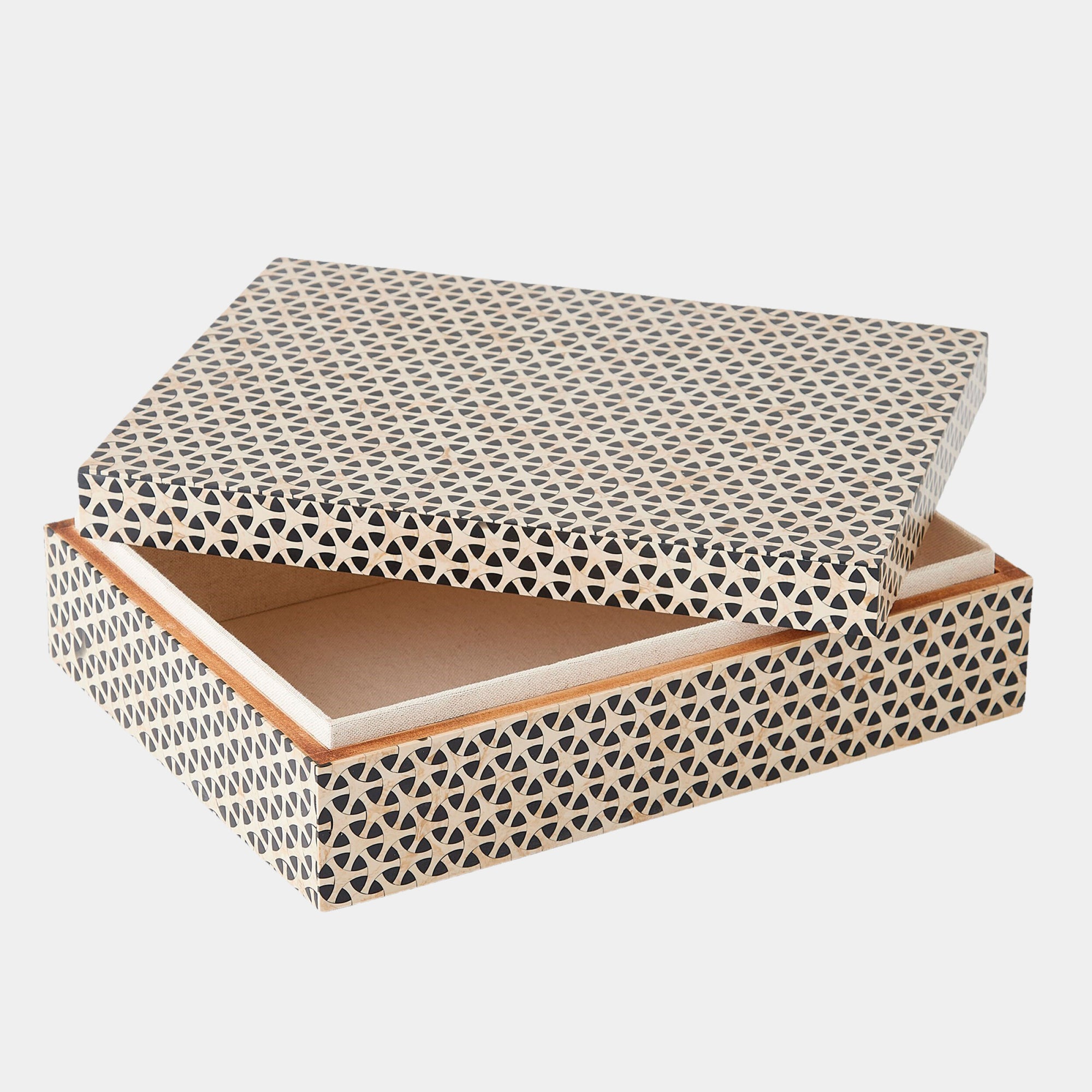 The Infinity Box L by Global Views is a rectangular box with its lid slightly open, showcasing a repeating pattern of small black triangles on a beige background. The box appears to be made of cardboard or lightweight wood.