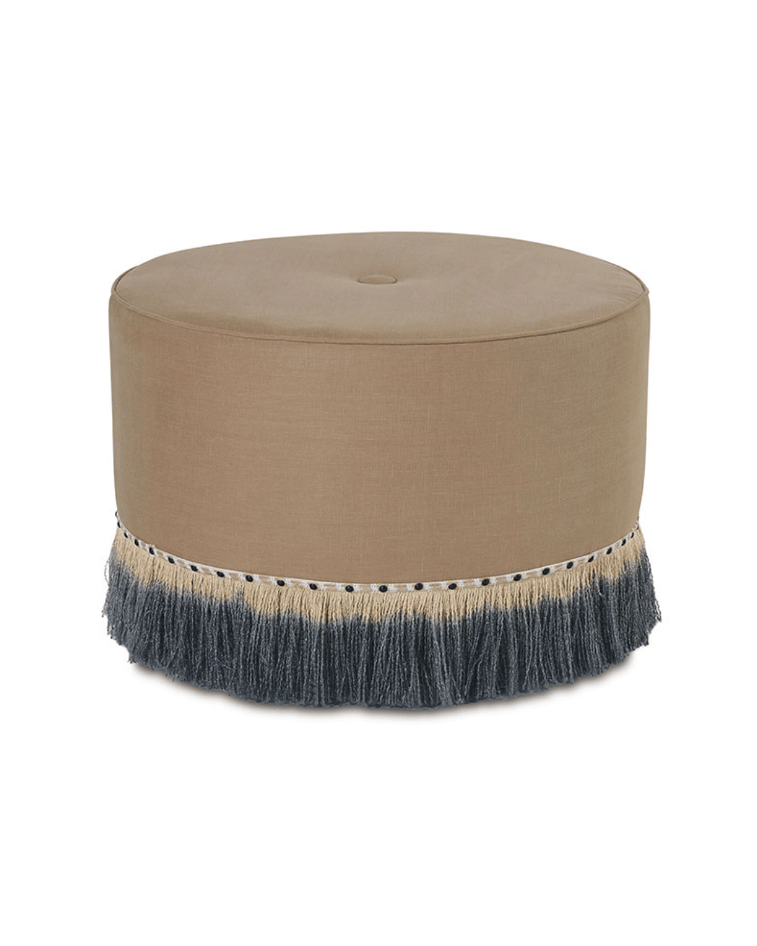 Introducing the Midori Linen Ottoman by Eastern Accents, featuring a round 29Dx20H design with a beige cushioned top and a fringed base. This stylish piece showcases two-toned fringe in cream over dark gray, enhanced by a button-tufted center. Decorative studs accentuate the seam while solid wood casters provide easy mobility, adding to its elegant design.