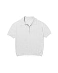 The Farley by Kule: a light gray cotton and silk polo sweater with short sleeves, collar, and two-button neckline, laid flat on a white background—perfect for effortless yacht style.