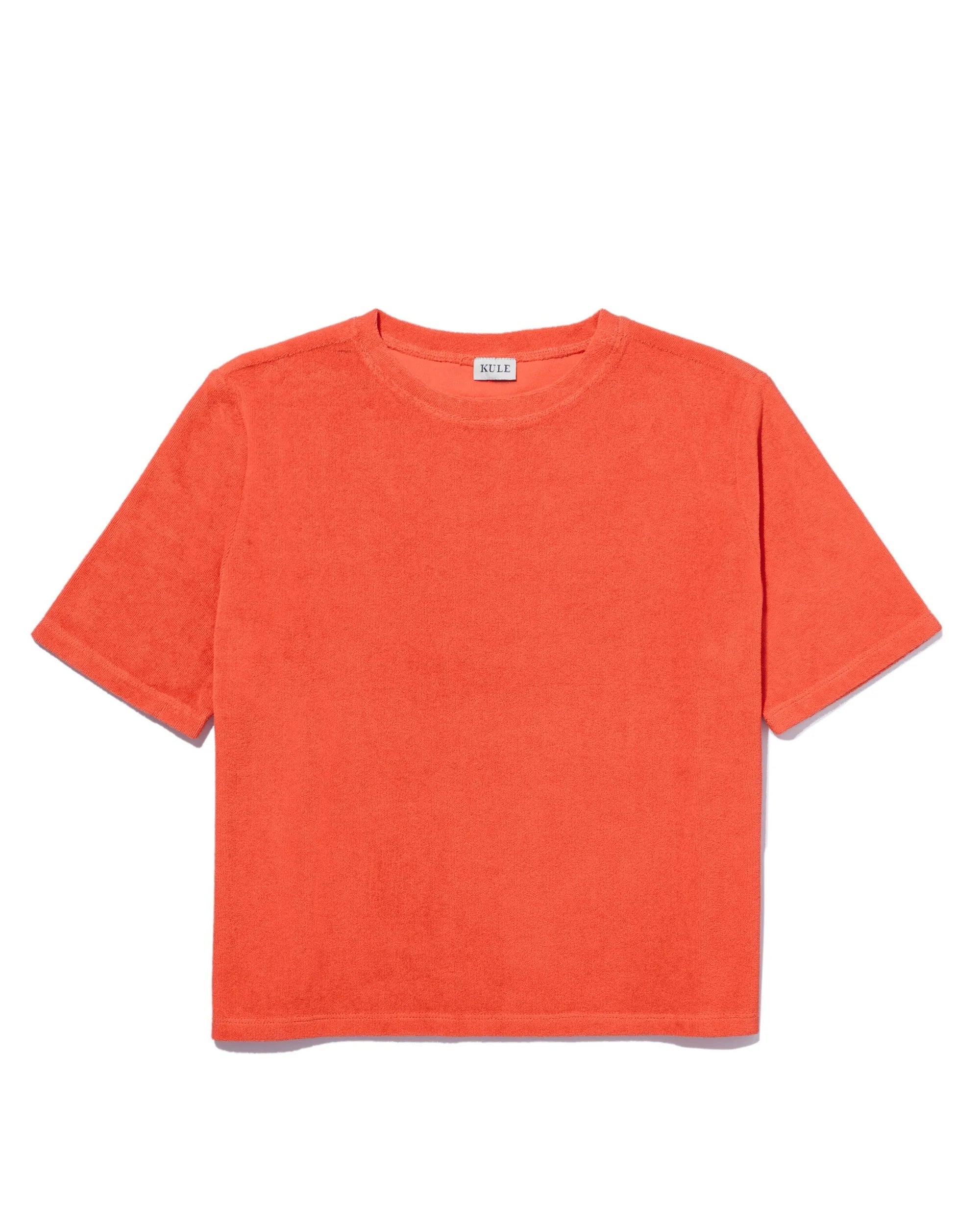 The Terry Hurley by Kule is a bright orange, short-sleeved cotton-blend t-shirt with a roomy fit, shown laid flat on a white background.