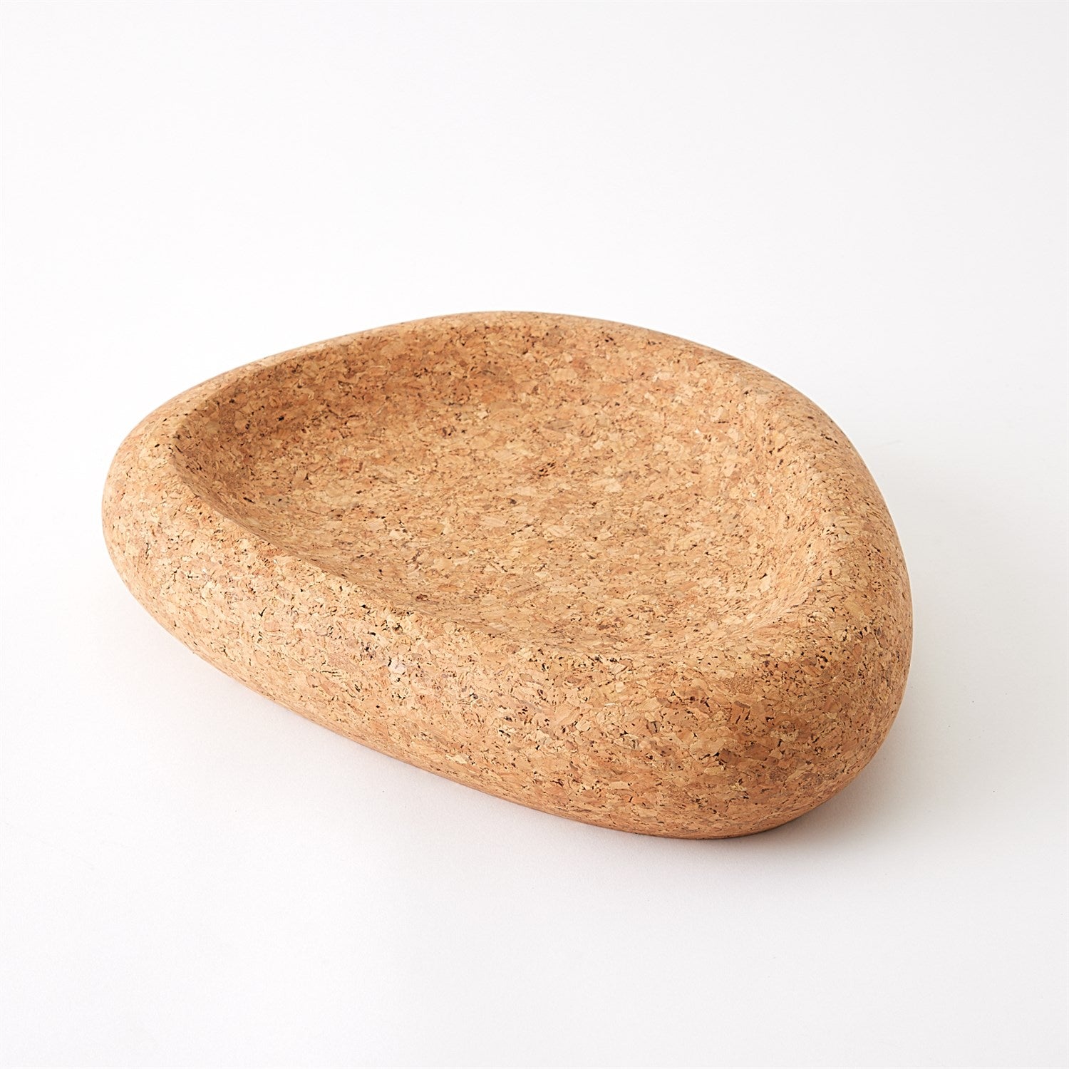 Introducing the Global Views Nuclia Cork Bowl Natural: a shallow, rounded dish crafted from natural materials, showcased on a white background. Its smooth textures and subtly irregular shape create an artistic decor piece resembling sculpted cork.