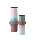 The Currey & Company 80's Vase Blue/Red set features two modern ceramic vases with a matte finish and soft pastel stripes—one tall, one short—evoking 80s elegance, displayed against a white background.
