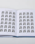 Hardcover book titled This Book Will Put You to Sleep by Hachette, cover features grid with repeating cat illustrations.