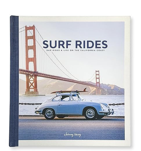 A book titled "Surf Rides" by Faire showcases a vintage white car epitomizing surf culture, complete with a surfboard atop, set against the backdrop of the iconic Golden Gate Bridge.