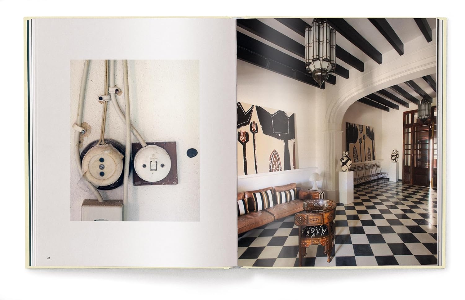 The Ingram Book Company’s "Creating A New Home In Mallorca" shows a close-up of vintage electrical outlets and a grand hallway with checkered floors, arches, and decor inspired by a Mallorca home renovation across two illustrated pages.