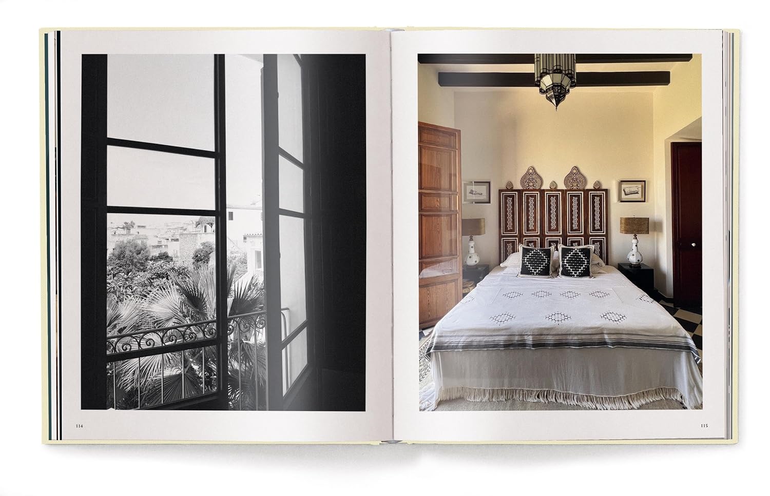 An open book, "Creating A New Home In Mallorca" by Ingram Book Company, displays a black-and-white photo of a window view with trees on the left page and a color photo of a neat bed in a Mallorca renovation on the right.