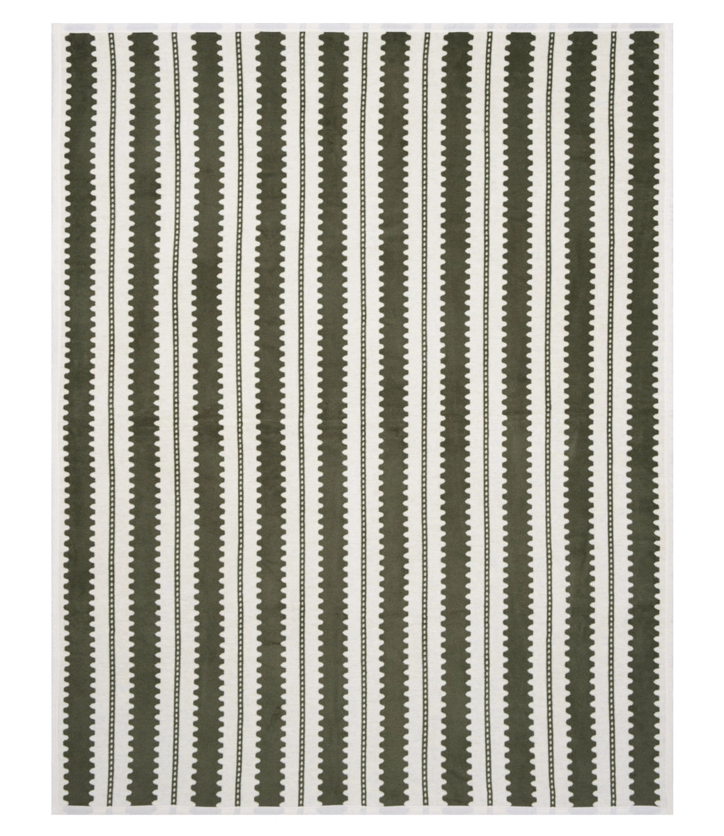 The Faire Collins Stripe Blanket features a white background with evenly spaced vertical warm olive stripes, each with jagged, wavy edges that form a bold zigzag pattern.