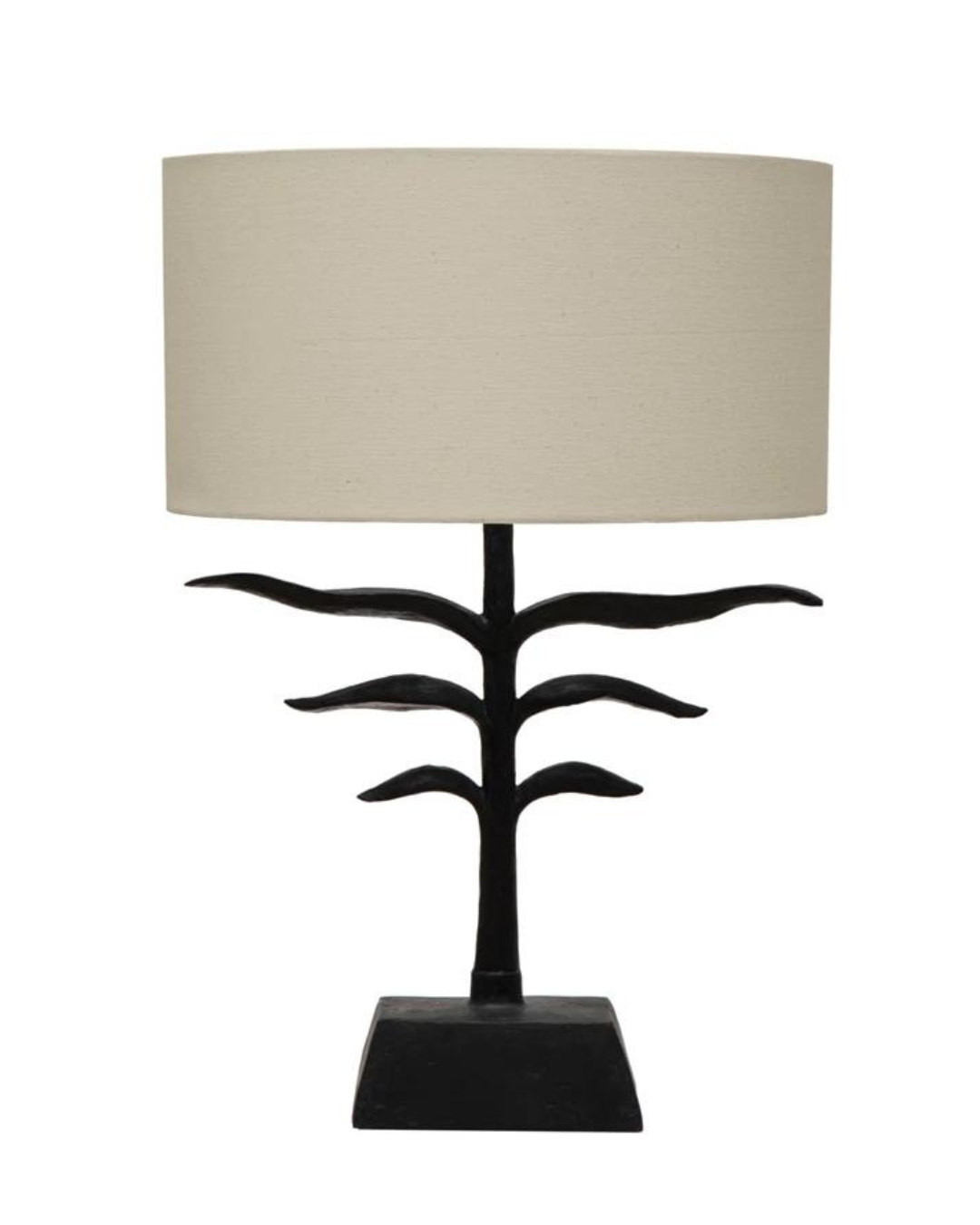 The Resin Leaf Shape Lamp by Creative Co-op is a modern table lamp featuring a black, tree-like metal base with branching arms and a cylindrical beige fabric lampshade. Its Scandinavian-inspired design creates a minimalist and artistic appearance.