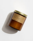 This hand-poured PFC Candle by Faire comes in a brown glass jar with a gold lid and features No. 21: Piñon scent, made from 100% soy wax and fine fragrance oils for a clean, inviting burn.