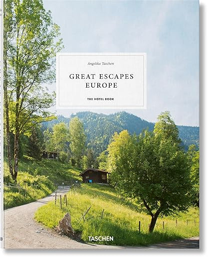 Book cover for "Great Escapes Europe" by Ingram Book Company, featuring a scenic rural landscape with winding roads, lush trees, grassy hills, and wooden cabins—evoking the charm of unique European hotels.