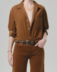 Kayla corduroy shirt by Citizens of Humanity/AGOLDE, styled with pants and gold jewelry for a casual chic look.