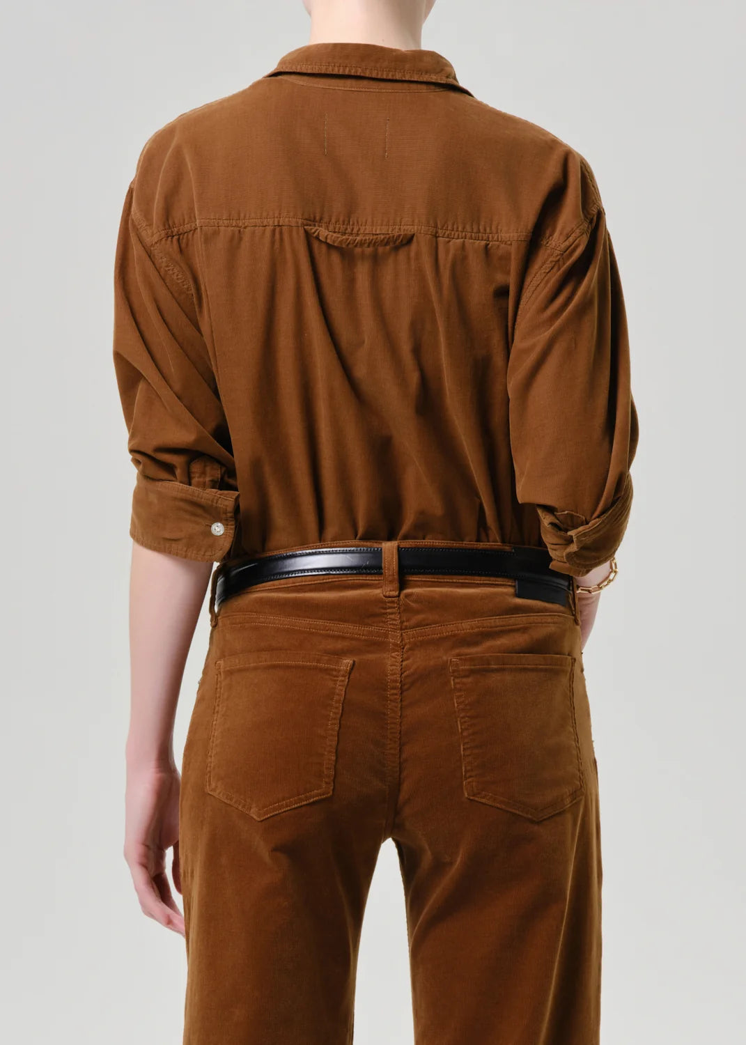 Kayla corduroy shirt and matching pants by Citizens Of Humanity, shown from behind with a black belt.