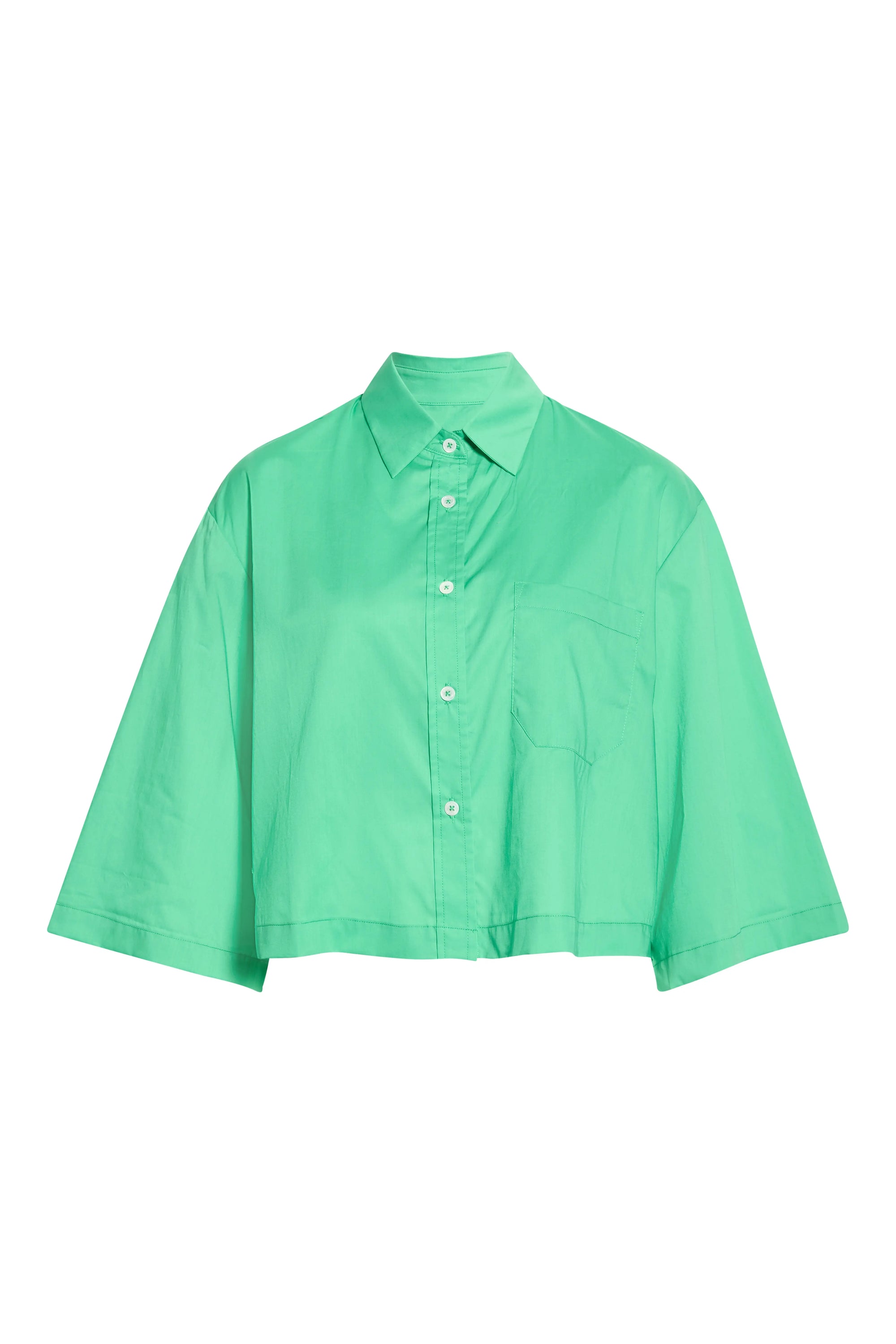 The PIXIE Shirt by Cissa is a bright green, cropped, short-sleeved cotton poplin shirt with a boxy silhouette and chest pocket, shown buttoned up and laid flat on a white background.