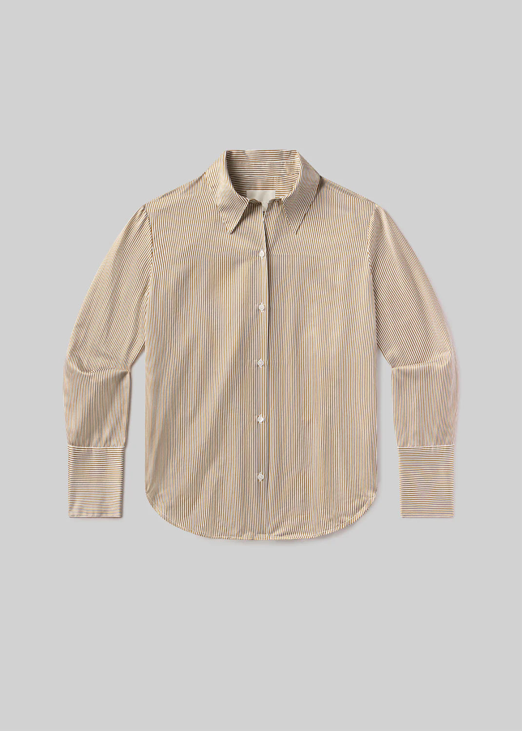 The Camilia Shirt by Citizens Of Humanity/AGOLDE features beige and white vertical stripes, long sleeves, button front, and a classic collar, shown laid flat on a light gray background.
