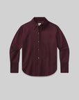 The Camilia Shirt by Citizens Of Humanity/AGOLDE is a deep burgundy, long sleeve button-front blouse with a classic collar and buttoned cuffs, shown flat on a light gray background for a timeless look.