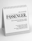 The Faire 52 Modern Manners white flip calendar, inspired by classic flip books, reminds: "Be a good passenger. When someone gives you a ride, acknowledge them," plus etiquette tips—be polite, engage in conversation, and thank the driver.