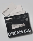 A black package labeled "DREAM BIG" contains bamboo silk Dream Strips by Faire, designed to improve sleep. They are breathable, hypoallergenic, and antimicrobial, suitable for 30-day use. Three patches are depicted.