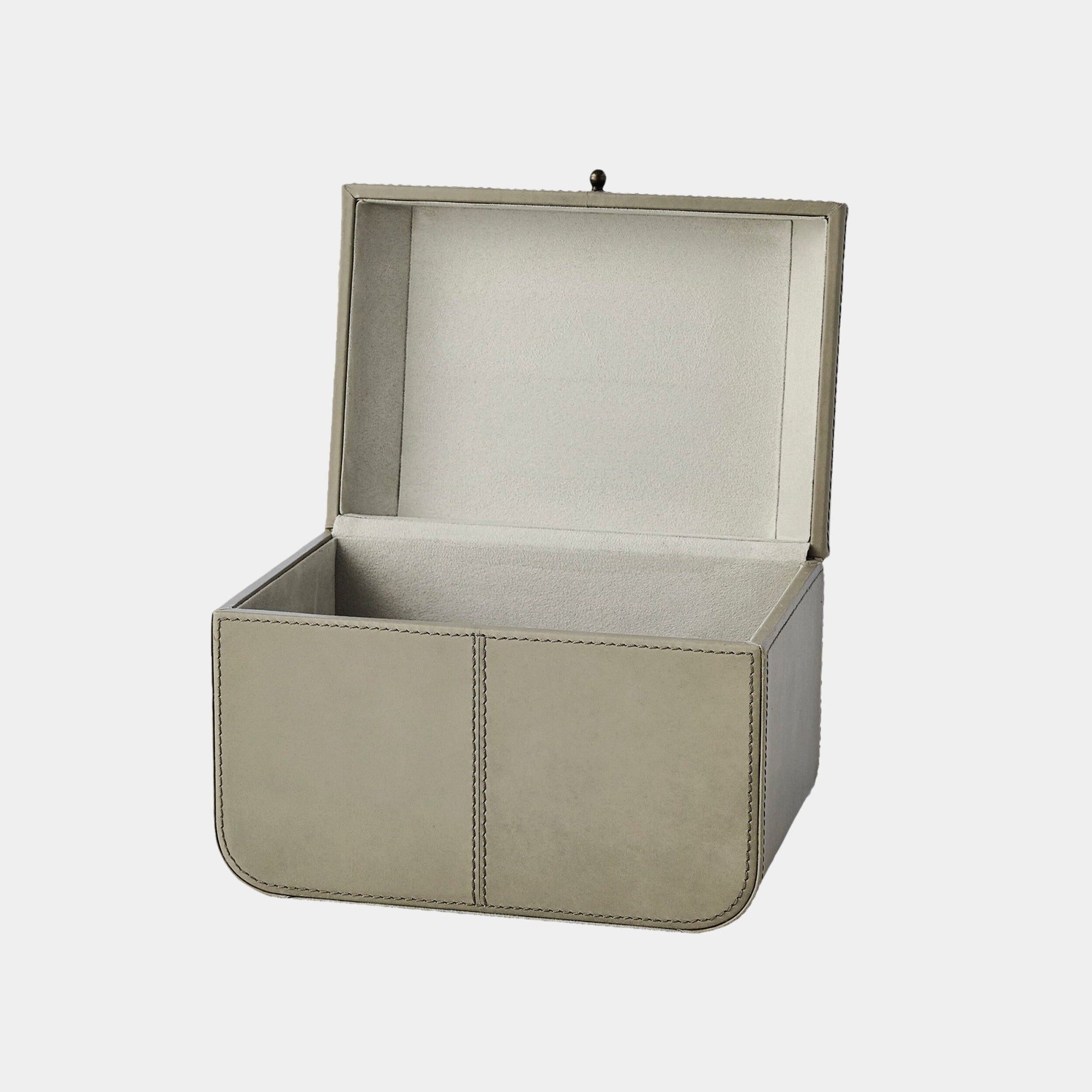 The Kersee Corner Box Light Gray by Global Views is a rectangular storage box with a hinged lid, smooth leather-like finish, visible front stitching, and clean lines. The light gray box opens to reveal an empty interior.