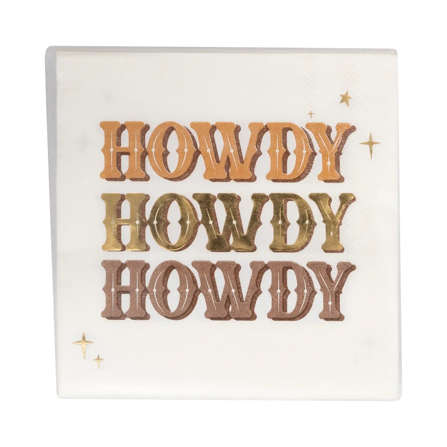 The MME Napkin by Faire is a decorative square paper napkin showcasing the word "HOWDY" repeated three times in shimmering metallic gold, silver, and bronze colors. It features small star-like designs scattered around the text on a pristine white background.