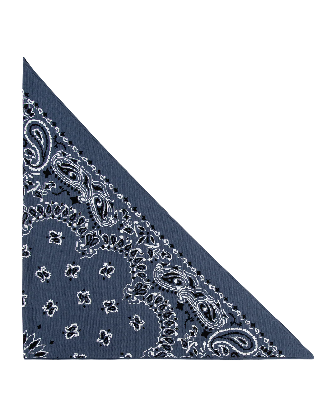 The Big Bandana Scarf by The Great Inc. is a navy blue vintage scarf with a white paisley and floral pattern, folded into a triangle and shown on a plain white background.